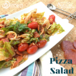 Pizza Salad recipe piled high on a white platter