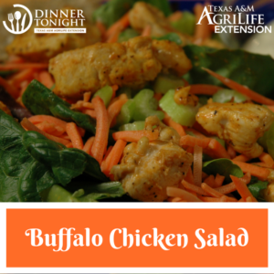 This picture shows green lettuce topped with buffalo flavored chicken