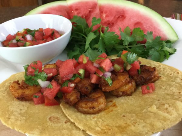 Close up image of shrimp tacos with southwest watermelon salsa