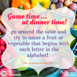 Game explanation on a faded white tile with a selection of fresh fruits and vegetables