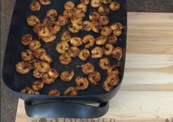image of shrimp tacos on a skillet at the end of cooking