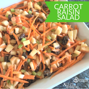 Carrot Raising Salad recipe plated in a white serving dish, ready for your dinner table!